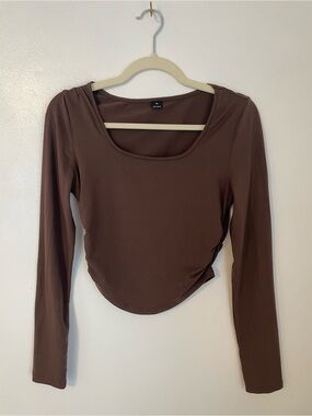 Brown long sleeve cropped top with ruched sides size medium